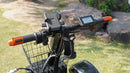 Close Up View Of The Green Transporter Cheeta Golf All-Terrain Mobility Scooter Handlebar In An Outdoor Setting