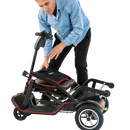 Man Folding The Feather Mobility Scooter