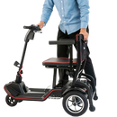 Man Standing Over Feather Mobility Scooter