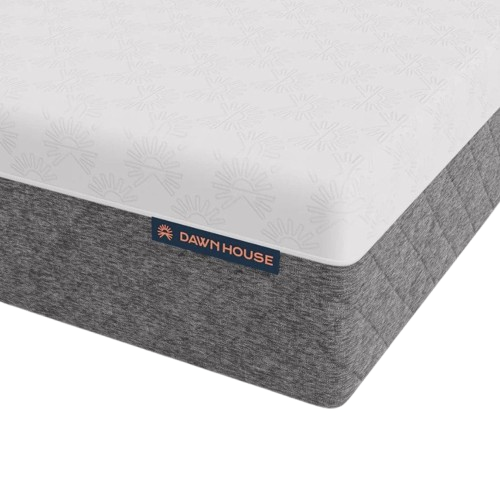 A Close-Up Studio Shot Of A The Corner Of The Luxury Dawn House Foam Mattress Showing A White Top Surface With A Subtle Sunburst Pattern And A Heather Gray Quilted Side, With A Visible Dawn House Label