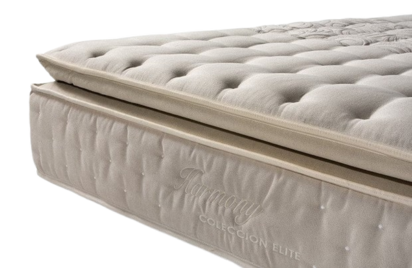 A Close-Up Studio Shot Of The Eurolux Harmony: The 11-Layer Luxury Mattress Crafted By Masters Corner Showing A Tufted Mattress Topper Resting On A Quilted Mattress. The Side Of The Mattress Features The Embossed Brand Name 'Harmony' And 'Coleccion Elite'