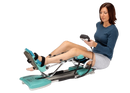 An Attractive Woman Using A Kinetec Spectra Essential Knee CPM Machine Which Is Designed For Knee Rehabilitation 