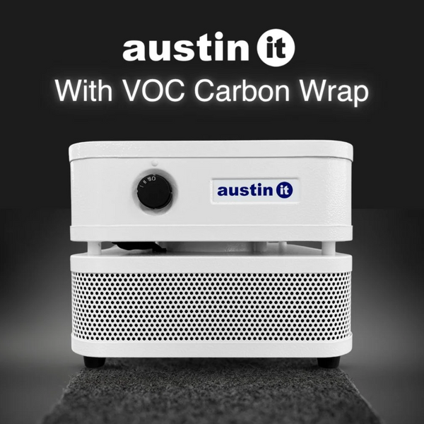 Austin Air Systems "it" Personal Compact Air Purifier With VOC Carbon Wrap Label, Shown On A Dark Gradient Background With The Text 'Austin It With VOC Carbon Wrap' Above It