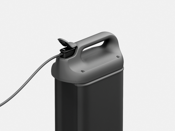 Close Up Overhead View Of The Battery For The STRUTT ev1 Smart Electric Mobility Vehicle Shown With The Charging Cable Attached