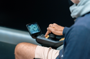 Close Up View Of A Man Pressing A Button On The Joystick Control Panel For The STRUTT ev1 Smart Electric Mobility Vehicle