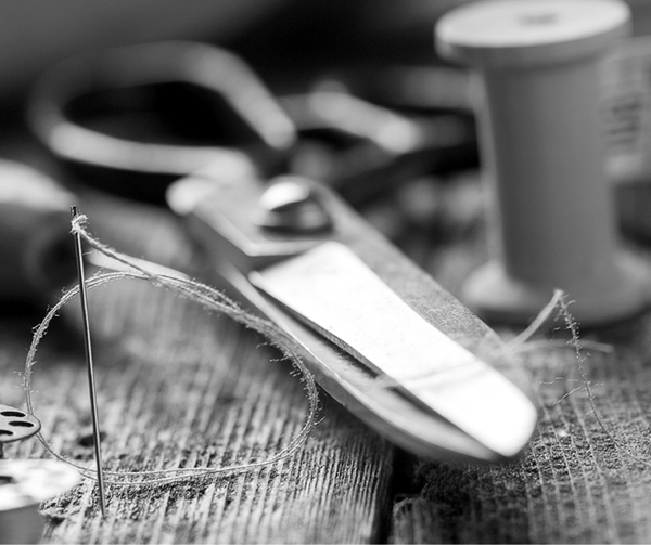 Close Up View Of Scissors And Yarn Highlighting The Handmade Work Behind The Creation Of The Eurolux Prive: The 10-Layer Luxury Mattress Crafted By Masters
