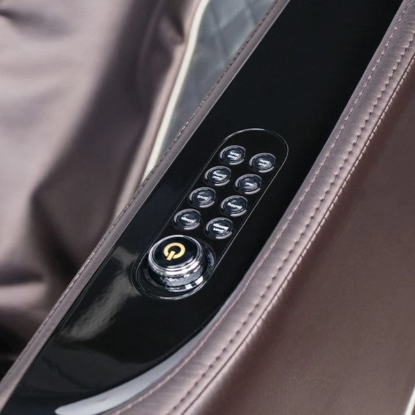 Close Up View Of The Armrest Controls For The Kyota Kizuna M688 Massage Chair Shown In Brown Color