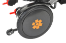 Close Up View Of The Bangeran Pegasus Cerebral Palsy Kids Electric Wheelchair Wheel In Orange Color