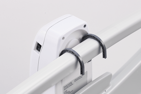 Close Up View Of The Control Unit Handing Off A Bed Frame For The Wellell Domus 1 & 2 Alternating Pressure Redistribution Mattress