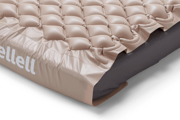 Close Up View Of The Corner Of The Wellell Domus 1 Alternating Pressure Redistribution Mattress