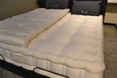 Close Up View Of The Eurolux Prive: The 10-Layer Luxury Mattress Crafted By Masters Shown In A Bedroom Setting With The Mattress Topper On The Right Left Side Of The Bed