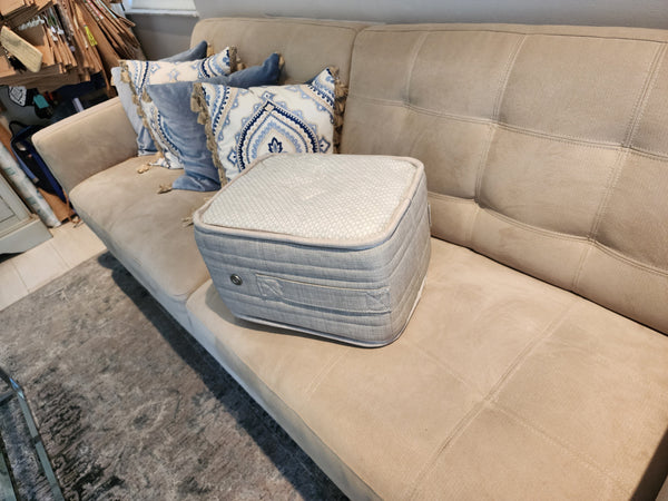 Close Up View Of The Eurolux Thermovisco: The 10-Layer Luxury Mattress Crafted By Masters Shown Inside The Compressed Box Upon Delivery