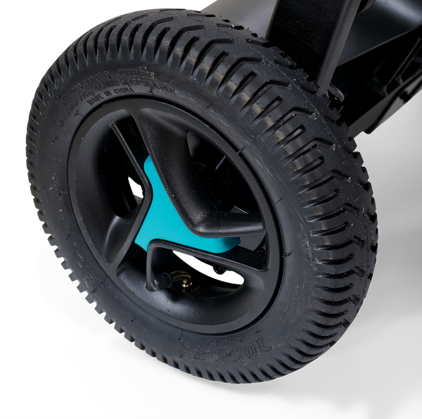 Close Up View Of The Golden Technologies Ally Electric Wheelchair Rear Wheel And Tire