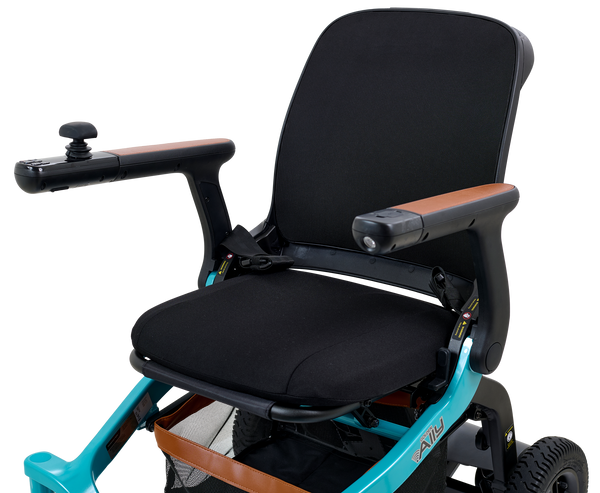 Close Up View Of The Golden Technologies Ally Electric Wheelchair Seat And Armrests Shown In Teal Color