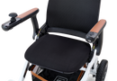 Close Up View Of The Golden Technologies Ally Electric Wheelchair Seat And Armrests Shown In White Color