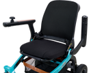 Close Up View Of The Golden Technologies Ally Electric Wheelchair Seat With Armrest In The Adjusted Position Shown In Teal Color