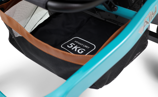 Close Up View Of The Golden Technologies Ally Electric Wheelchair Under Seat Storage Compartment Shown In Teal Color