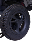 Close Up View Of The Golden Technologies Ally Pro Omnidirectional Electric Wheelchair Rear Tire
