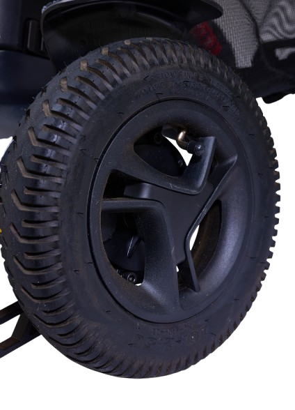 Close Up View Of The Golden Technologies Ally Pro Omnidirectional Electric Wheelchair Rear Tire