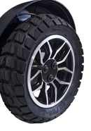 Close Up View Of The Golden Technologies Ally Sport Omnidirectional Electric Wheelchair Rear Wheel