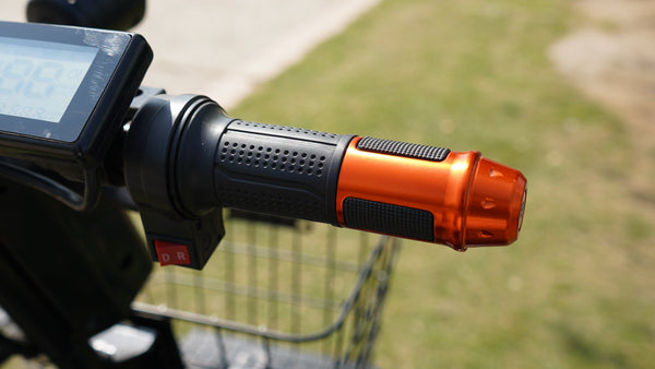 Close Up View Of The Green Transporter Cheeta Golf All-Terrain Mobility Scooter Right Handle