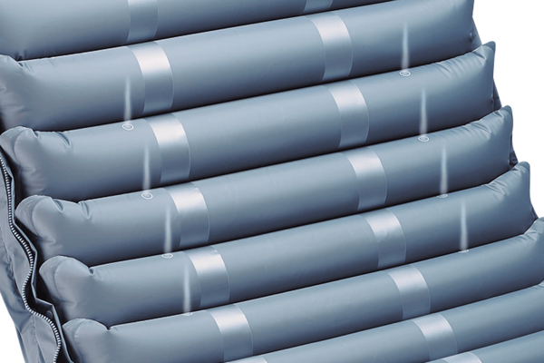 Close Up View Of The Inflatable Cells Of The Wellell Domus 3 Alternating Pressure Redistribution Mattress System With Quilted Cover