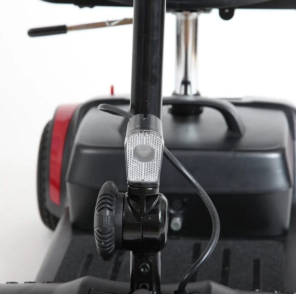 Close Up View Of The Journey Adventure Mobility Scooter Light Shown In Red Color