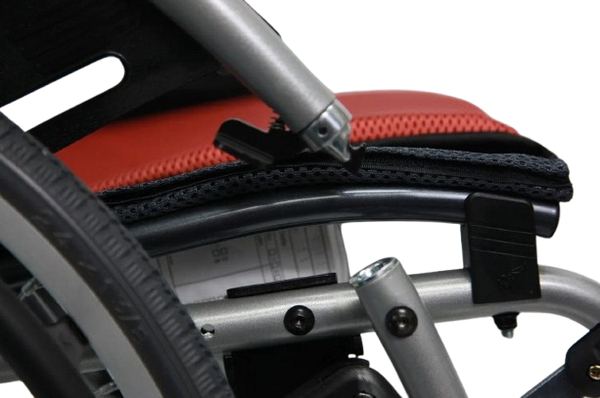 Close Up View Of The Karman S-Ergo 125 Wheelchair Shown With Red Cushions And Silver Frame