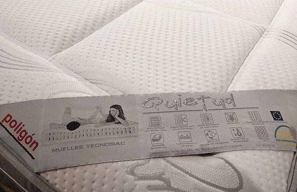 Close Up View Of The Marketing Tag For The Eurolux Quietud: The 9-Layer Luxury Mattress Crafted By Masters Highlighting Its Features