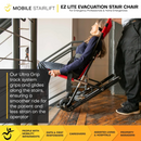 Close Up View Of The Mobile Stairlift EZ LITE Evacuation Stair Chair Shown With A Woman In The Chair While Moving Down The Stairs