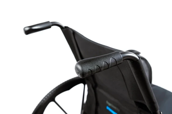 Close Up View Of The Push Handles For The Front Centered View Of The Strongback ErgoSteel Wheelchair