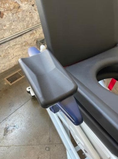 Close Up View Of The Rebotec Phoenix Height Adjustable Shower Commode Chair Armrest Cushion