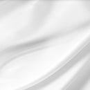 Close Up View Of The Rize Home Silk Pillowcase Shown In A White Wavy Pattern 