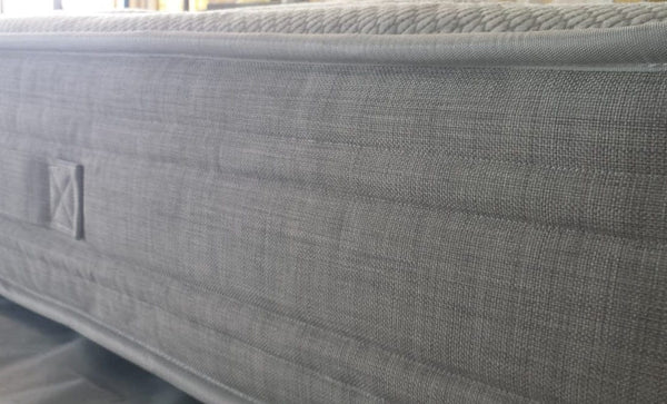 Close Up View Of The Side Of The Eurolux Thermovisco: The 10-Layer Luxury Mattress Crafted By Masters Highlighting The Design Elements