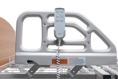 Close Up View Of The Side Rail And Remote Hanging On It For The Graham Field Matrix 6200 Hi-Low Hospital Homecare Bed