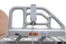 Close Up View Of The Side Rail And Remote Hanging On It For The Graham Field Matrix 6200 Hi-Low Hospital Homecare Bed
