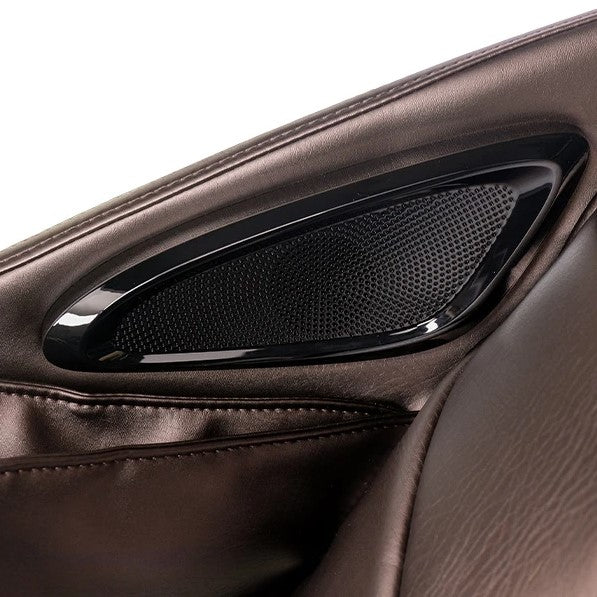 Close Up View Of The Side Speaker For The Kyota Kizuna M688 Massage Chair Shown In Brown Color