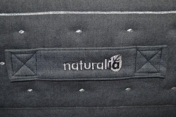 Close Up View Of The Stitching With Text Reading 'Naturalia' On The Side Of The Eurolux Multisens: The 11-Layer Luxury Mattress Crafted By Masters
