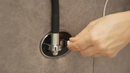 Close Up View Of The USB Type A And Type C Ports For The StarSleep Starise Massage Lift Chair Shown With A Human Hand Inserting A Cable Into The Type C Port