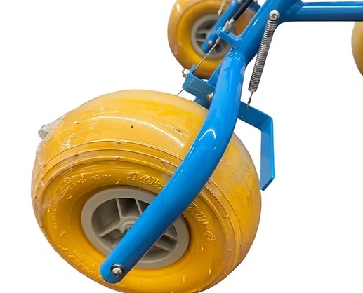 Close Up View Of The Wheels Of The AccessRec AccessWalk® All-Terrain Beach Rollator Shown In Blue Frame