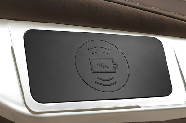 Close Up View Of The Wireless Charging Station For The Kyota Joubu M880 4D Massage Chair In Black And Dark Brown Color