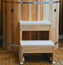 Close Up View Of The Wooden Steps For The Dynamic Cedar Cold Plunge Barrel
