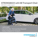 Elderly Woman Folding The Strongback Excursion 12S +AB Lightweight Transport Chair Demonstrating Its Lightweight Frame