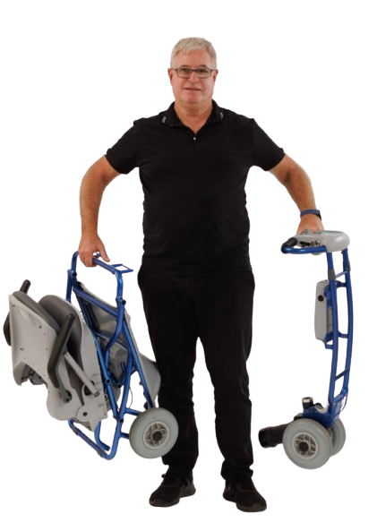 Front Centered View Of An Elderly Man Holding Two Pieces Of The Tzora Feather Ultra Lightweight Mobility Scooter Shown In The Blue Color