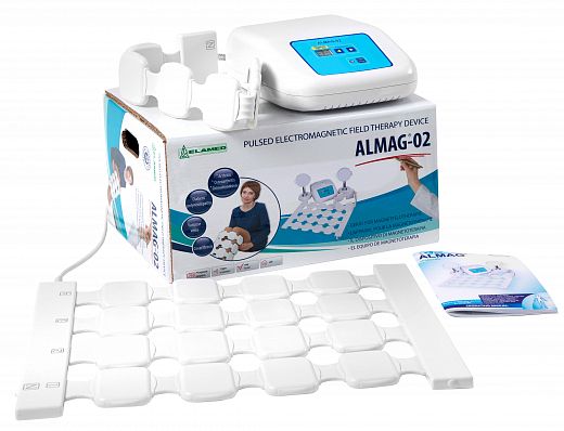 Front Centered View Of The Almagia International ALMAG-2 PEMF Therapy Device Shown With Packaging In The Background