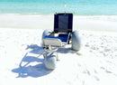 Front Centered View Of The Debug Mobility EZ Roller Floating Beach Chair In A Beach Setting With The Ocean In The Background