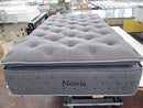 Front Centered View Of The Eurolux Novis: The 5-Layer Luxury Mattress Crafted By Masters Shown In A Factory Setting