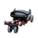 Front Centered View Of The FreeRiderUSA Luggie Standard Folding Mobility Scooter Shown In The Flat Folded Position In The Red Color