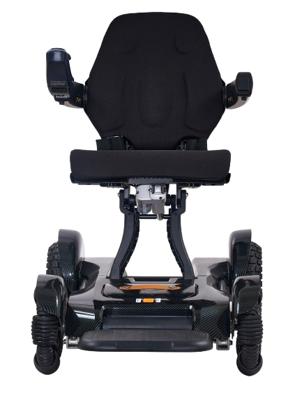 Front Centered View Of The Golden Technologies Ally Sport Omnidirectional Electric Wheelchair Shown In Carbon Fiber Color