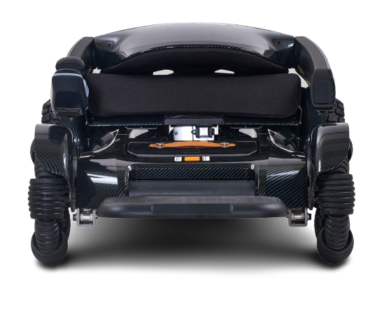 Front Centered View Of The Golden Technologies Ally Sport Omnidirectional Electric Wheelchair Shown In Carbon Fiber Color In The Folded Position